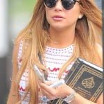 28A3F7D200000578-3080683-Religious_text_Lindsay_Lohan_was_spotted_carrying_a_copy_of_the_-m-1_1431563528968