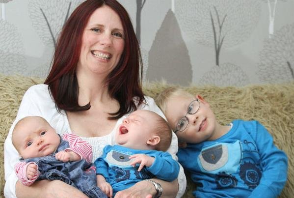 Triplets born nearly three years apart