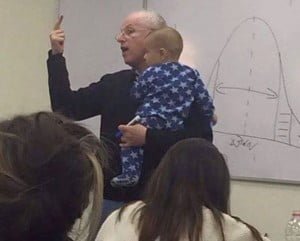 A photo of professor holding student's baby goes viral photo of professor holding student's baby