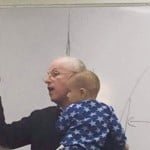 lecturer-soothes-crying-baby-professor-sydney-engelberg-hebrew-university-1-e1431621584891