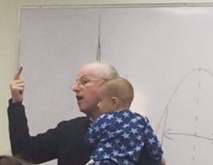 A photo of professor holding student's baby goes viral photo of professor holding student's baby