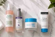 Skincare routine for combination skin UK laid out on a marble surface including cleanser, niacinamide serum, moisturiser and SPF