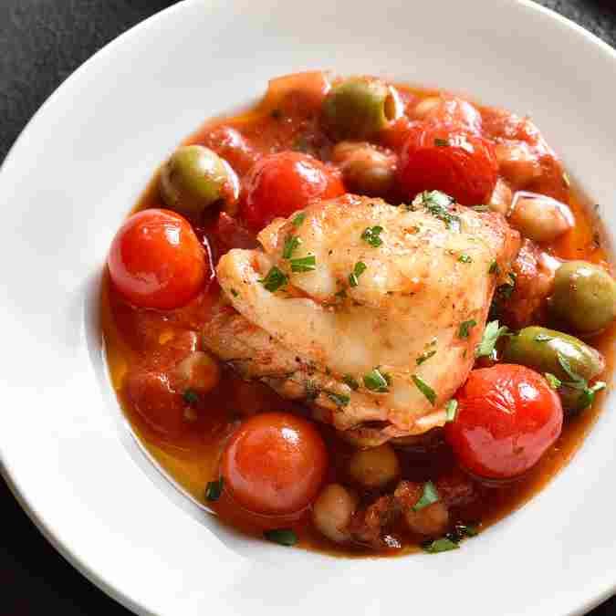 Easy Healthy Dinner Recipes UK: 8 Nutritious Weeknight Meals the Whole Family Will Love Baked cod with chickpea and tomato sauce, a quick healthy dinner recipe for UK families