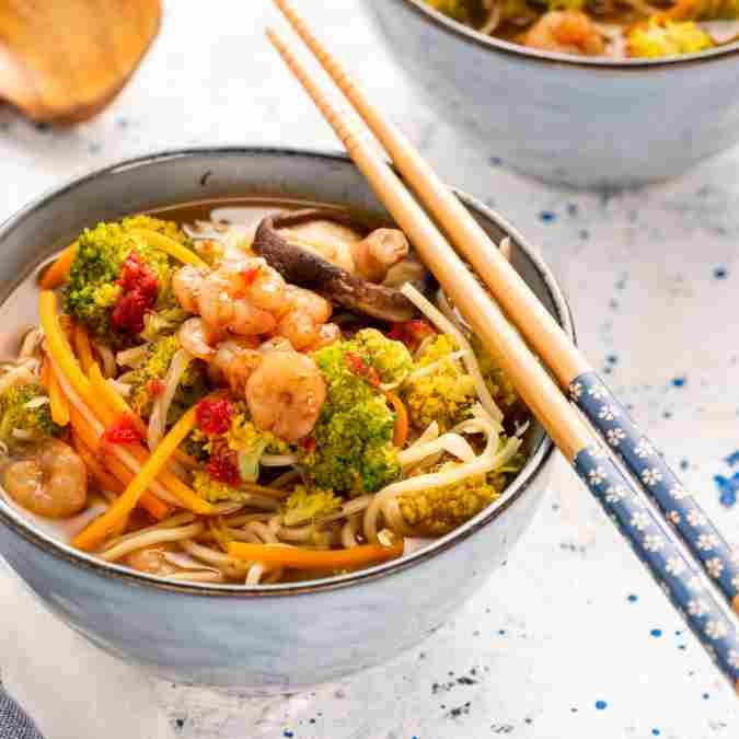 Easy Healthy Dinner Recipes UK: 8 Nutritious Weeknight Meals the Whole Family Will Love Prawn and vegetable noodle bowl with pak choi and carrots, a light easy healthy dinner recipe ready in 20 minutes