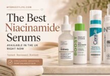 Best Niacinamide Serum UK 2026: Tested and Rated Flatlay of the best niacinamide serum UK options including The Ordinary and Paula's Choice on a marble surface