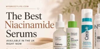 Flatlay of the best niacinamide serum UK options including The Ordinary and Paula's Choice on a marble surface