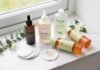 A selection of top-rated skincare products from a review of the best toner for oily skin UK, featuring brands like Paula's Choice and The Ordinary on a marble windowsill.