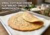 Cottage Cheese Flatbread Recipe: The Viral 2-Ingredient High-Protein Bake Cottage Cheese Flatbread Recipe: A freshly baked golden cottage cheese flatbread folded on parchment paper on a baking tray, surrounded by an egg, cottage cheese, and spice jars.
