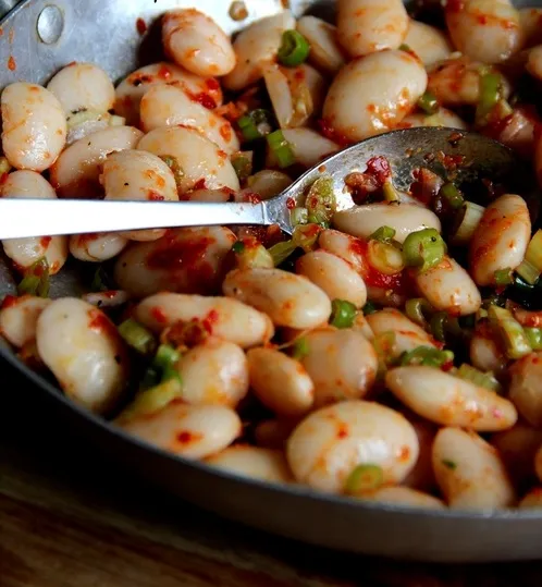 Recipe: Giant Beans with harissa and scallion